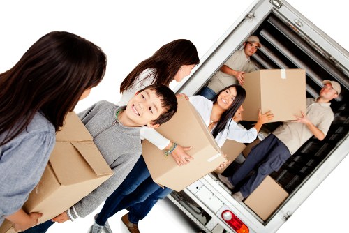 Removal van moving household furniture in a Maryland neighborhood