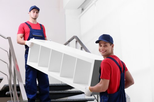 Local moving team handling boxes and furniture in Maryland