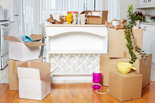 Furniture being moved through a townhouse or apartment staircase