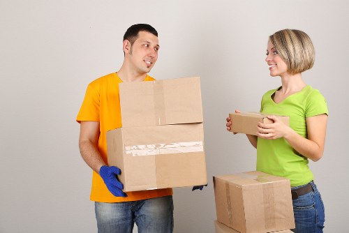 Packed moving boxes and furniture prepared for a Maryland removal service