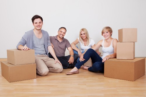 Careful wrapping of fragile household items during a Maryland move